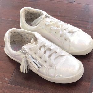 White sneakers with a zipper
